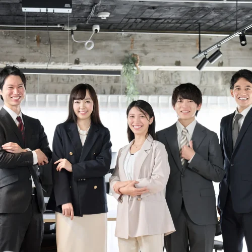 Professional team of certified translators and language specialists in modern office environment with industrial design.